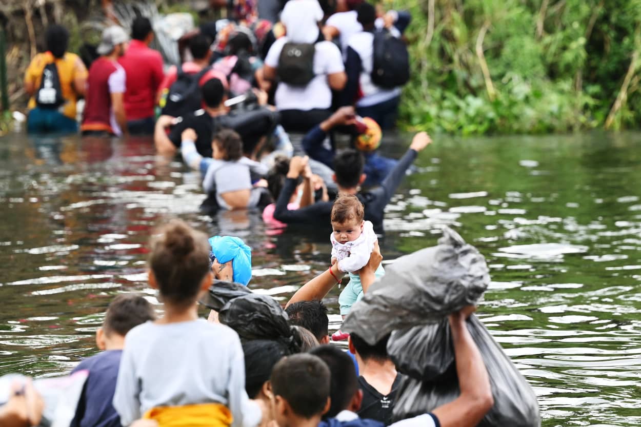 Migrant cross the Rio Grande in Matamors, Mexico, on their way to the U.S. on May 11, 2023.