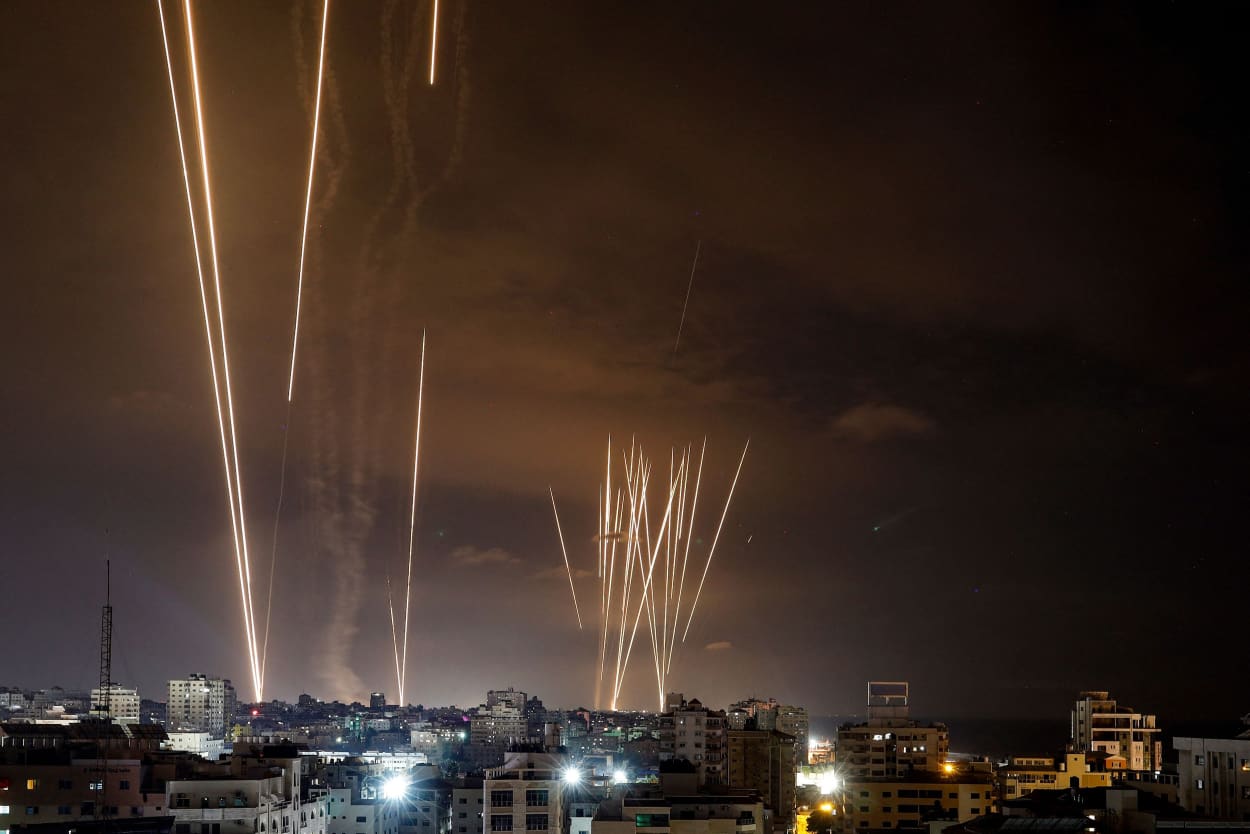 Launched rockets illuminate the dark sky in Gaza City