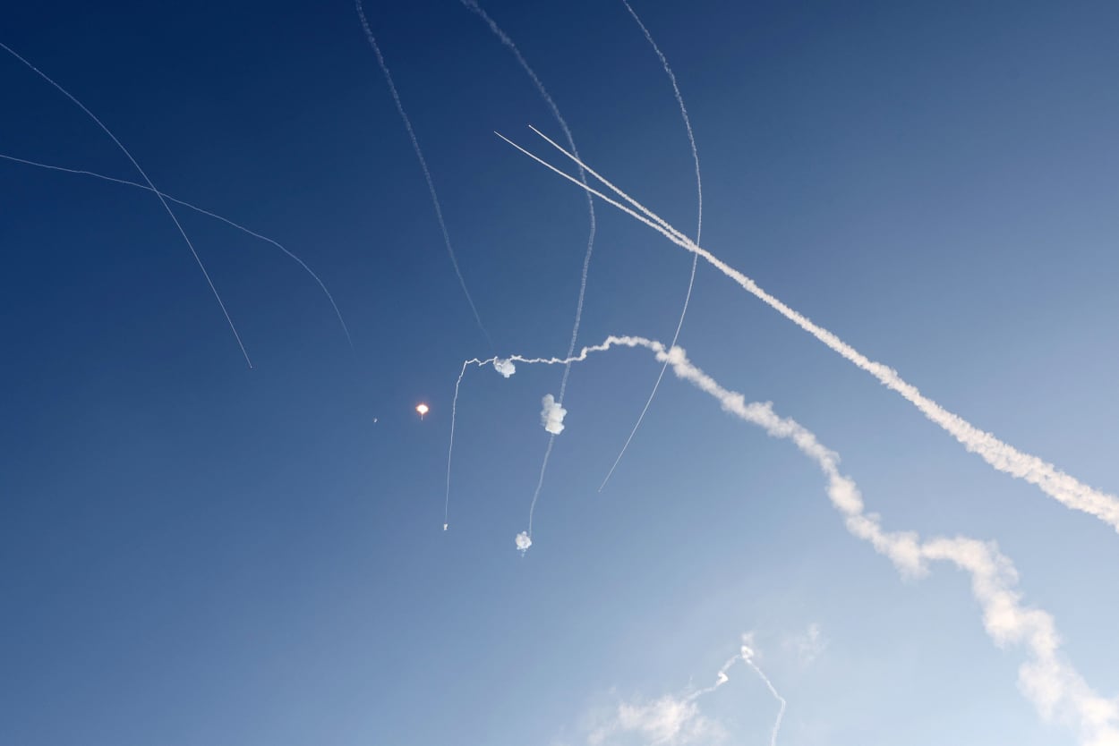 Israel's Iron Dome defense missile system intercepts rockets fired from Gaza over Ashkelon.