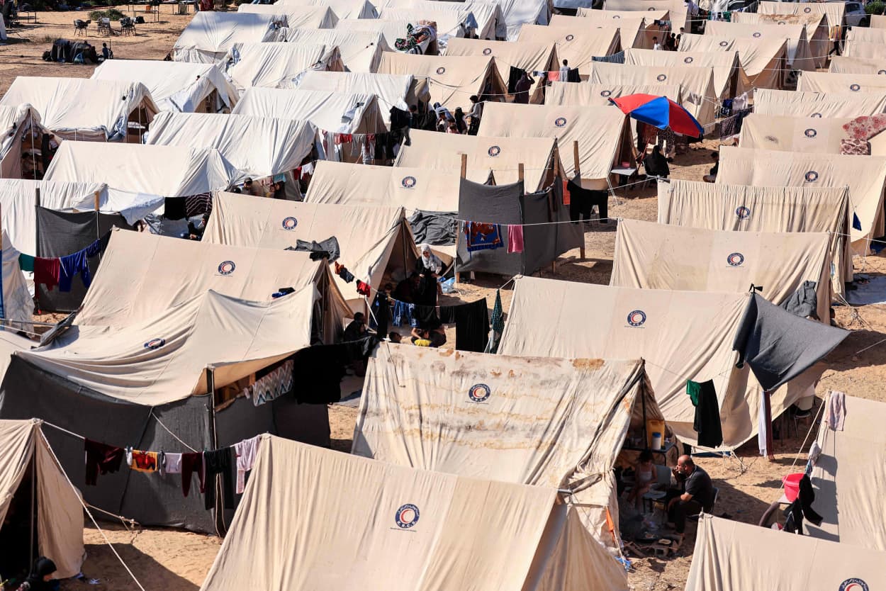 Tents for Palestinians seeking refuge are set up on the grounds of an UNRWA centre in Khan Yunis in the southern Gaza Strip.