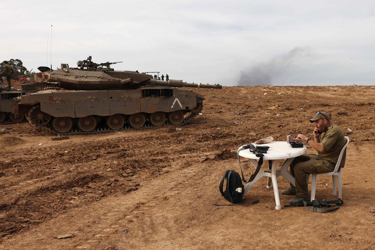 IDF Soldier Eats Food Next To Tank