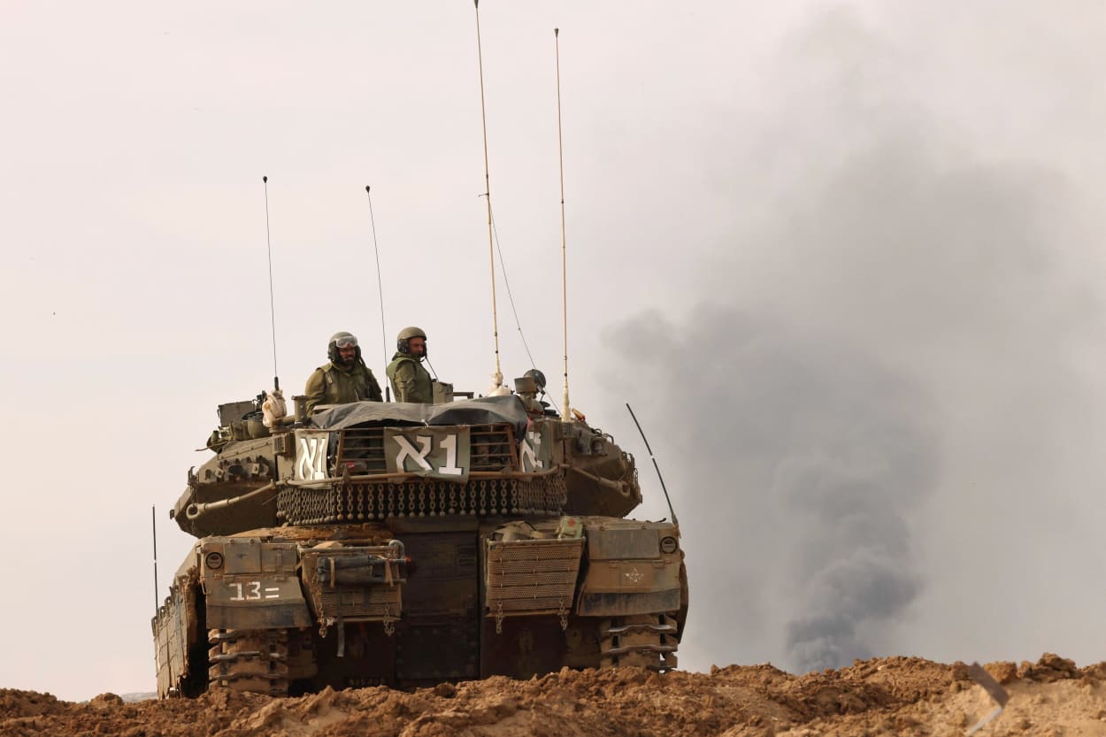 An Israeli tank repositions in an area near the Gaza Strip in southern Israel on Nov. 22, 2023.