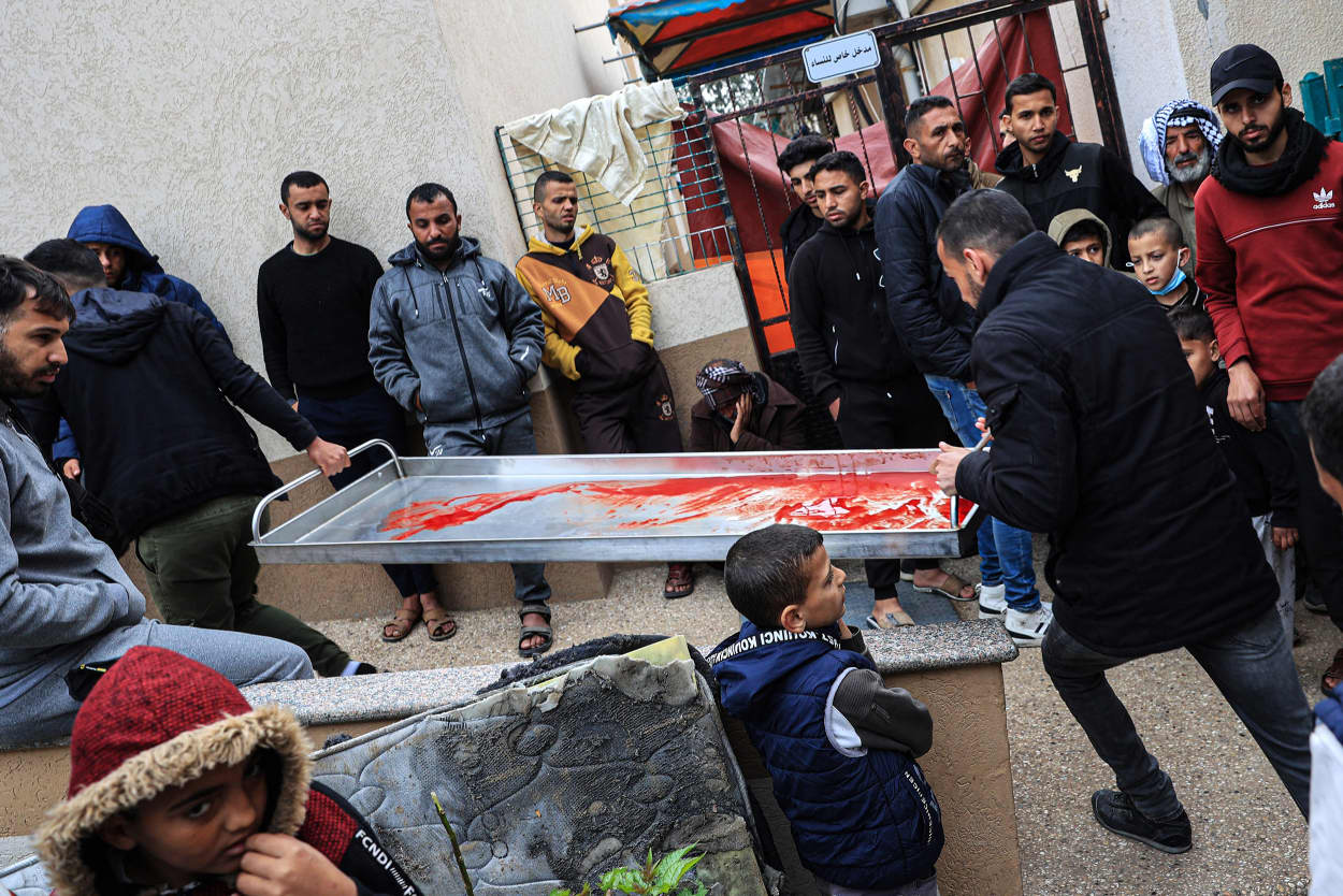 Blood soaked gurney outside hospital in Rafah, southern Gaza