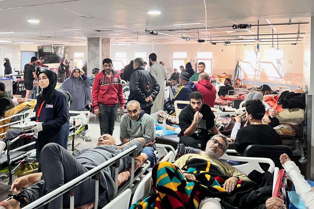 Wounded Palestinians wait to be treated at al-Shifa Hospital in Gaza City on Dec. 16, 2023.