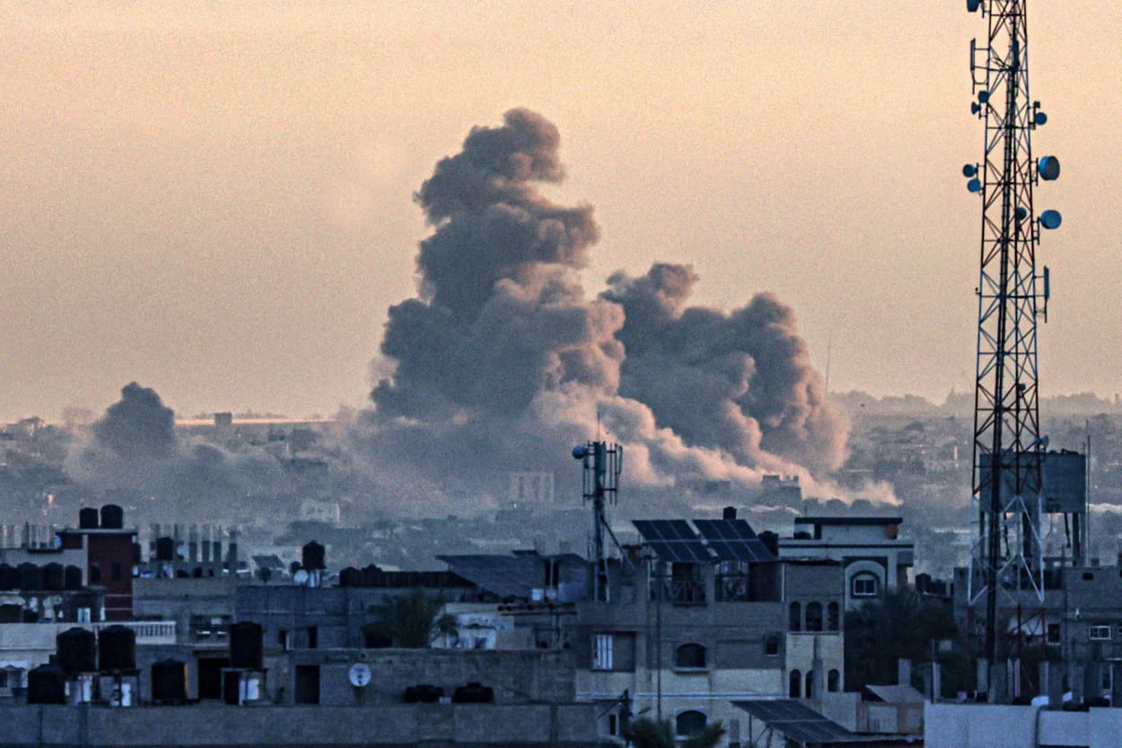 Smoke billows over Khan Younis in the southern Gaza Strip on Jan. 14, 2024.