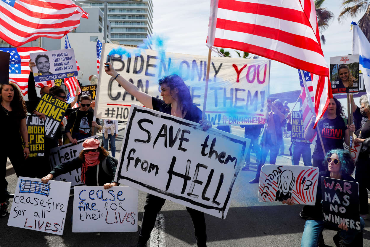 Demonstrators rally outside the Embassy of United States, in Tel Aviv