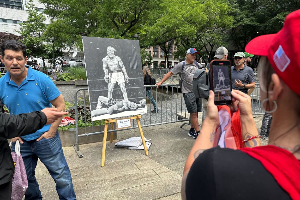 fan art (“Cry-Baby,” acrylic on canvas) depicting Trump as a boxer knocking out Robert De Niro.