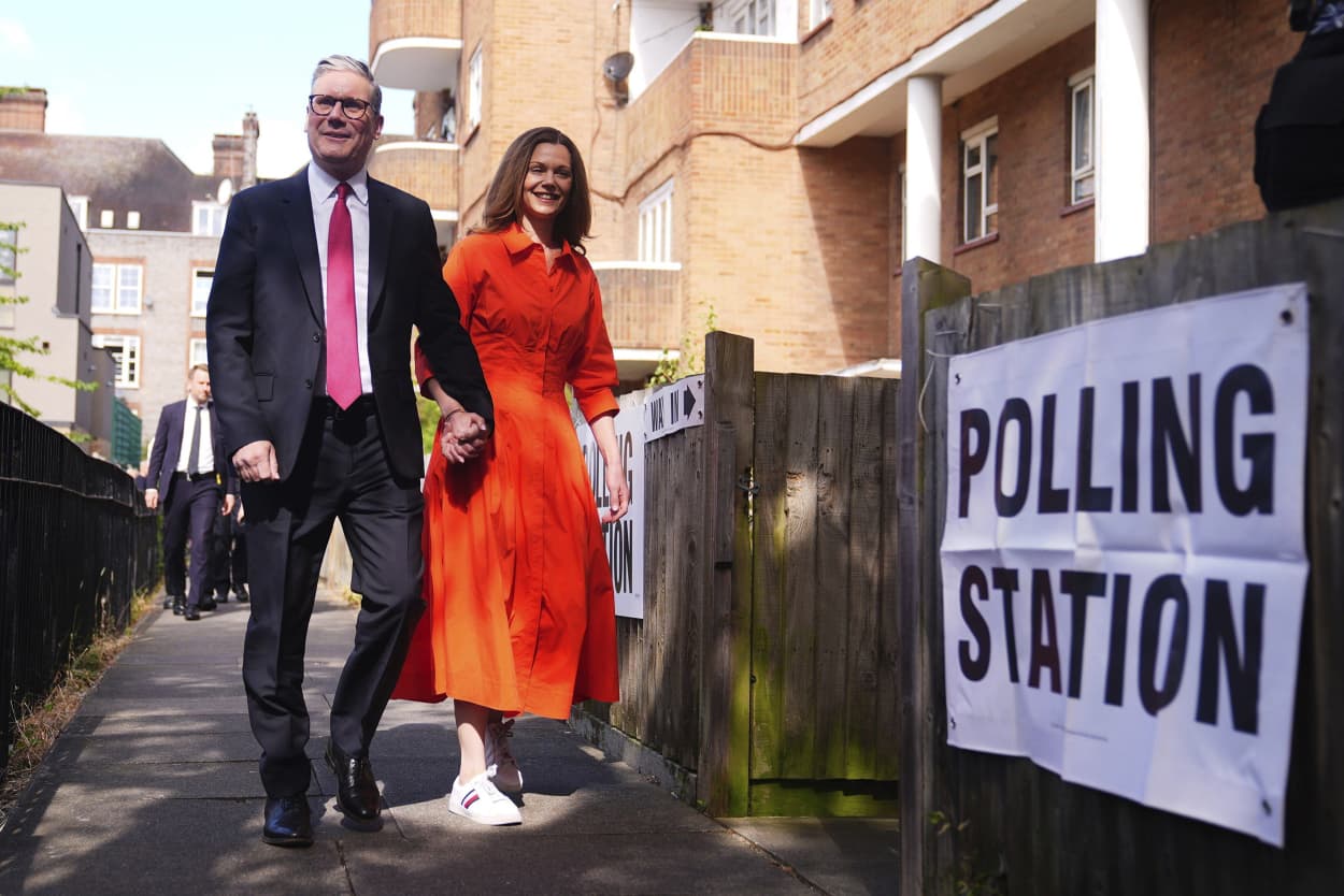 Labour leader Keir Starmer and his wife Victoria arrive to cast their votes in the 2024 General Election in London on July 4, 2024.