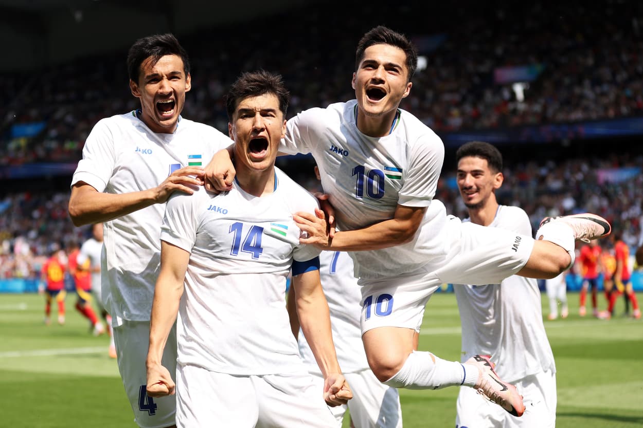 Eldor Shomurodov scores during an Olympic soccer match between Uzbekistan and Spain in Paris, France.
