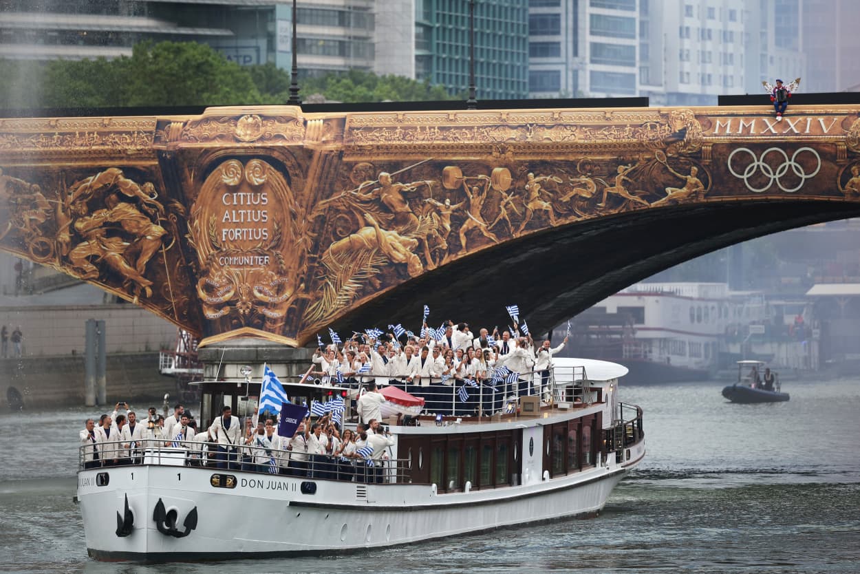 Team Greece begins the athlete's parade.