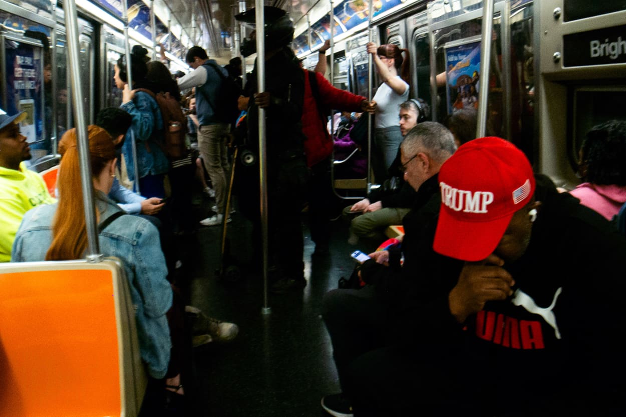 A commuter wears a Trump hate on the subway