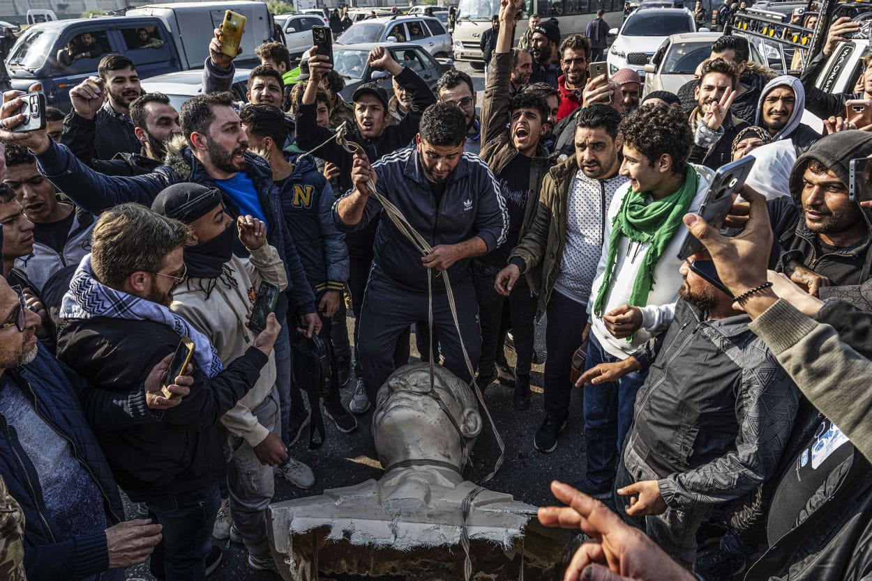 Statues of Hafez al-Assad toppled by people in Syria