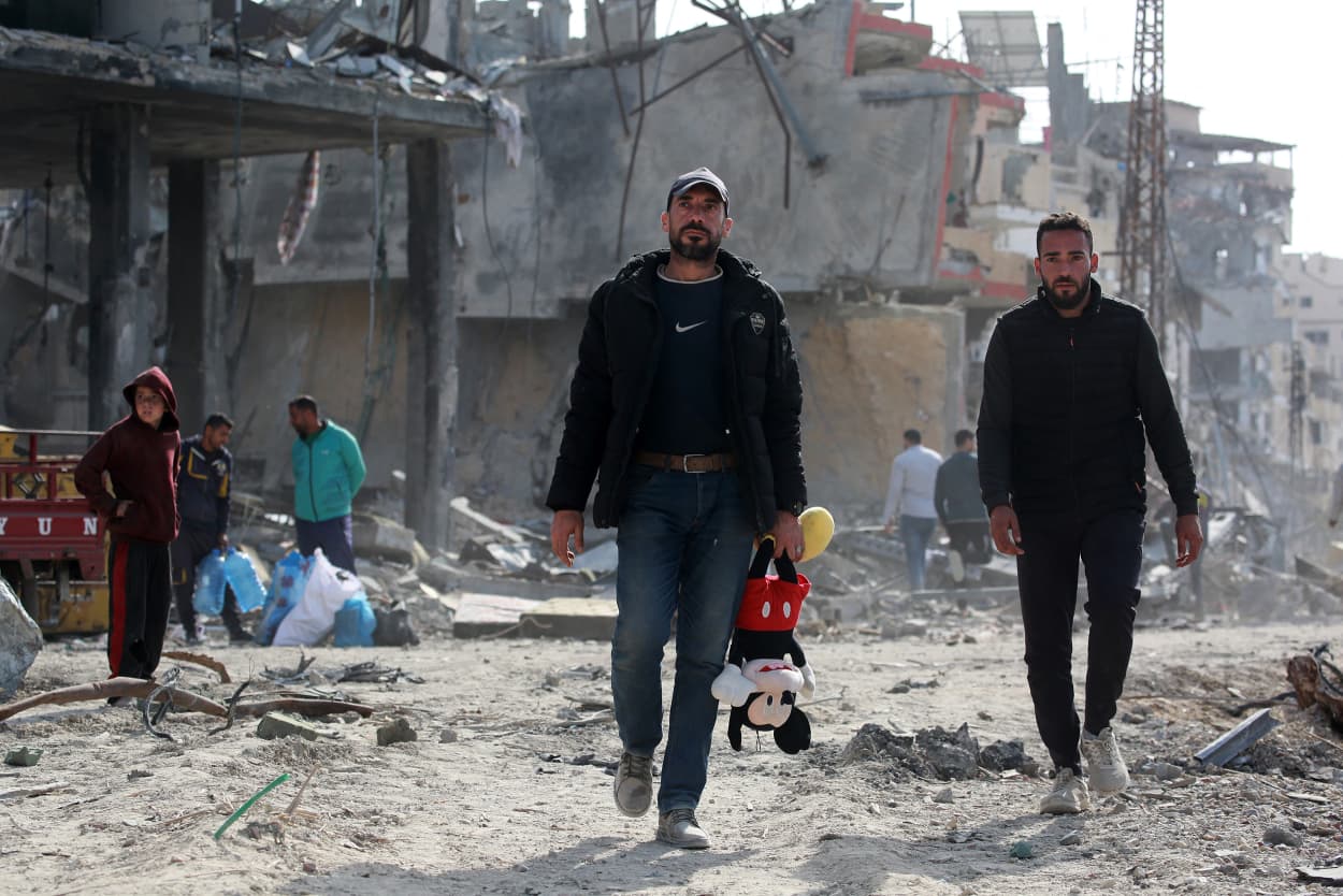 Thousands of Gazans carrying tents, clothes and their personal belongings were seen heading back to their homes, after more than 15 months of war that displaced the vast majority of Gaza's population, in many cases more than once.