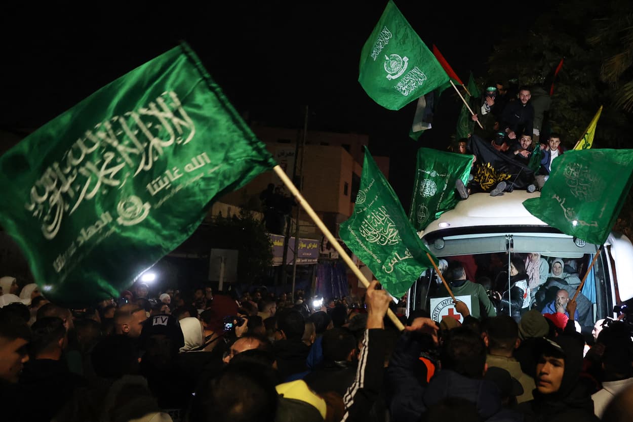 Crowds cheered, chanted and honked car horns as two buses carrying the prisoners arrived in Beitunia following their release as part of the Gaza ceasefire deal that began on January 19 and saw three Israeli hostages freed by Hamas in the Gaza Strip.