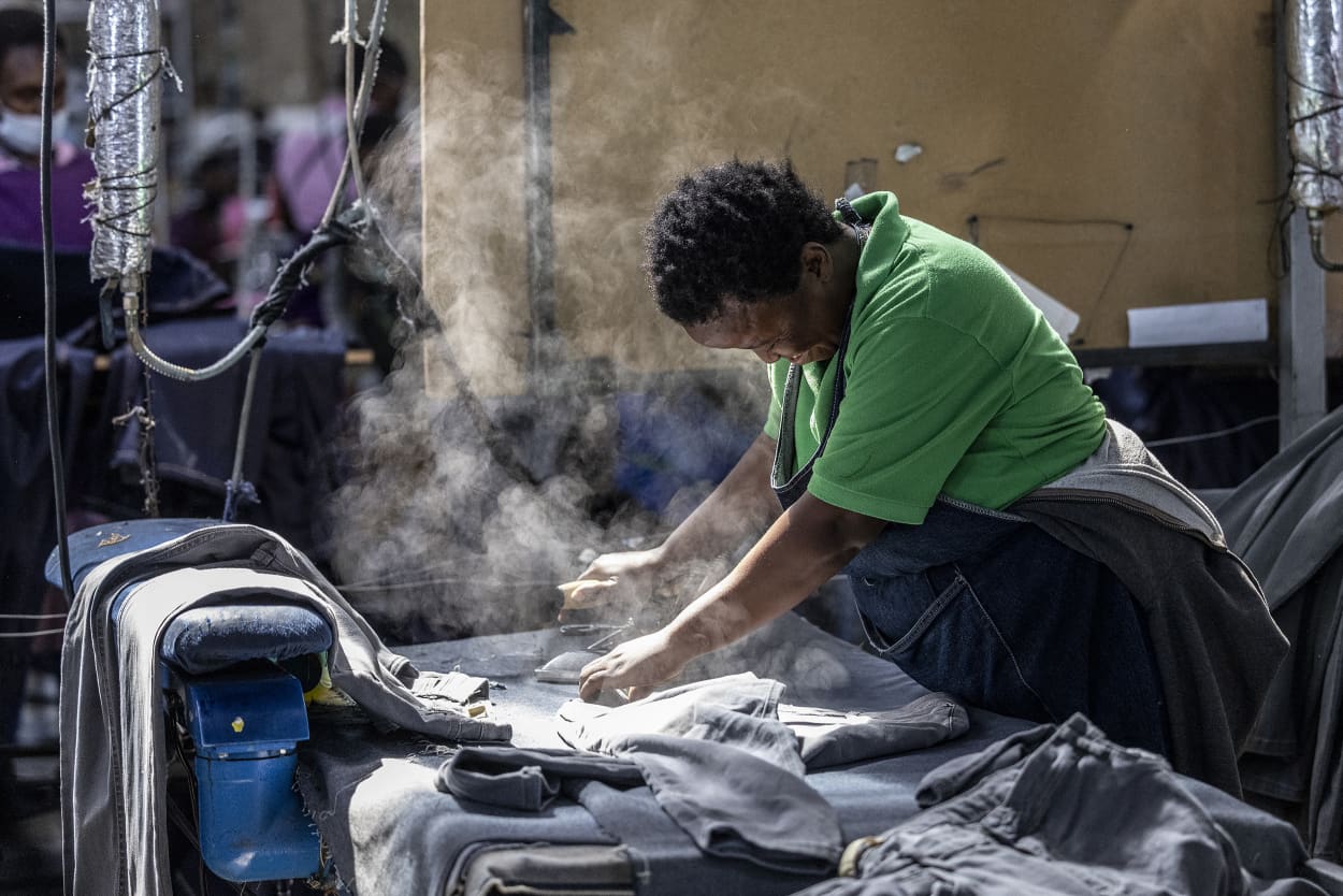 In a sweltering factory in Lesotho, rows of workers hunch over thrumming sewing machines churning out piles of denim jeans for global shoppers from this country US President Donald Trump mocked as unknown.
