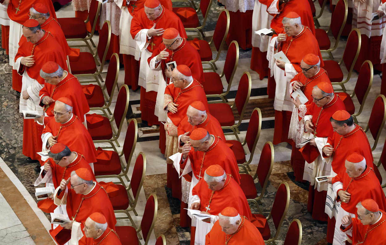Cardinals look on as the body of Pope Francis is transferred into the Basilica at St Peter's Square on April 23, 2025 in Vatican City.