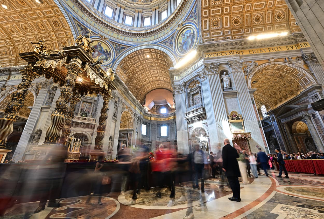 Mourners pay their respects to Pope Francis in the Vatican on April 23, 2025. 