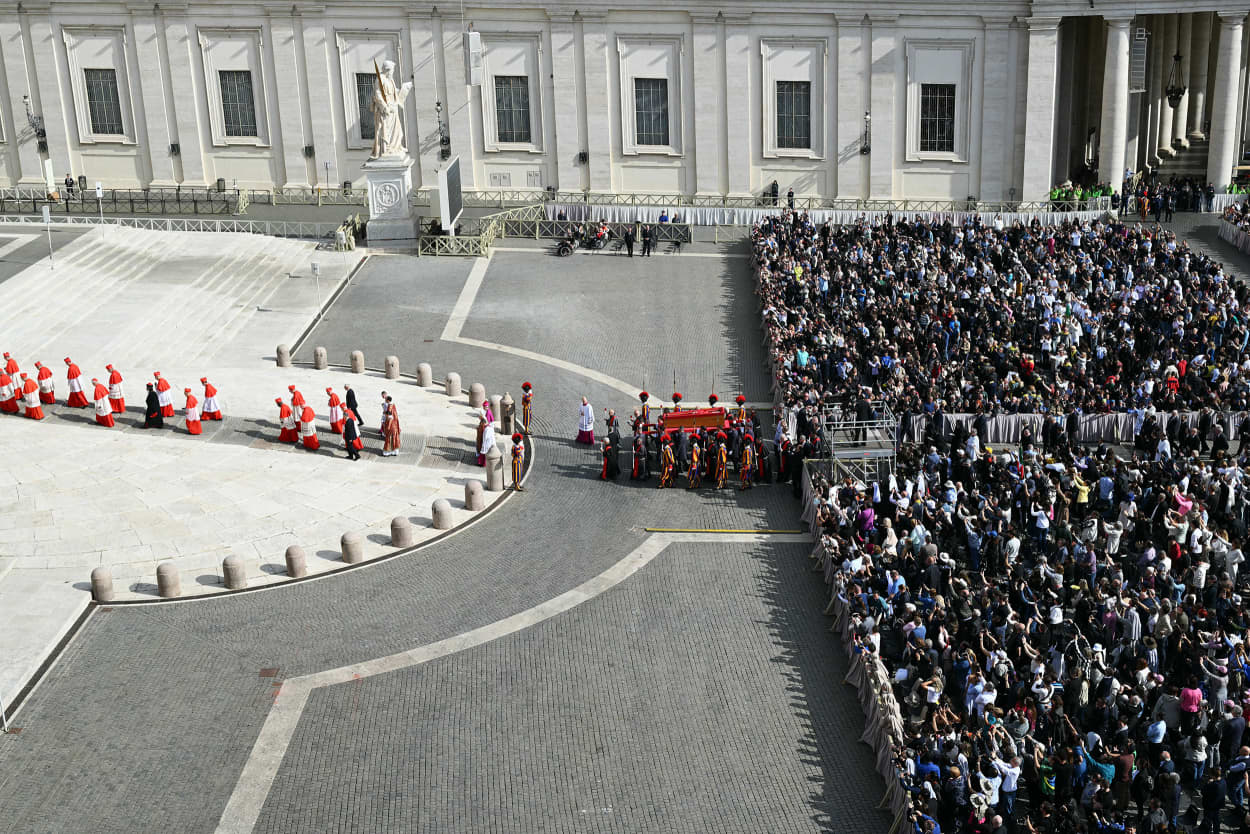 Pallbearers carry the coffin of the late Pope Francis toward St Peter's Basilica on April 23, 2025. 