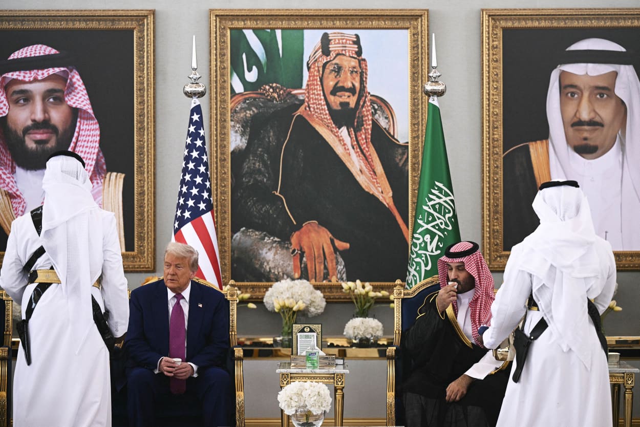 Saudi Crown Prince Mohammed bin Salman (R) and US President Donald Trump drink coffee ahead of their meeting in Riyadh
