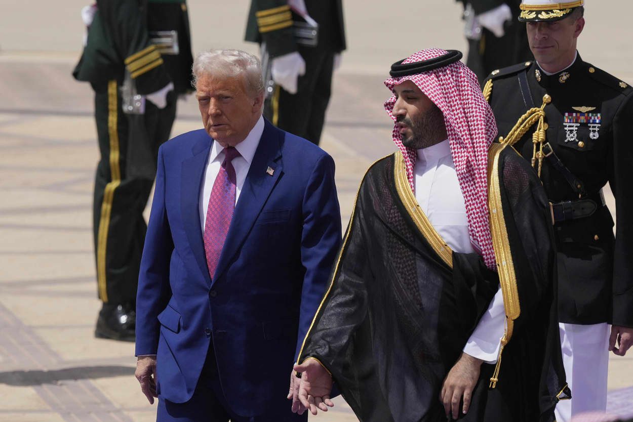 Donald Trump speaks with Saudi Crown Prince Mohammed bin Salman during an arrival ceremony at the Royal Terminal of King Khalid International Airport in Riyadh