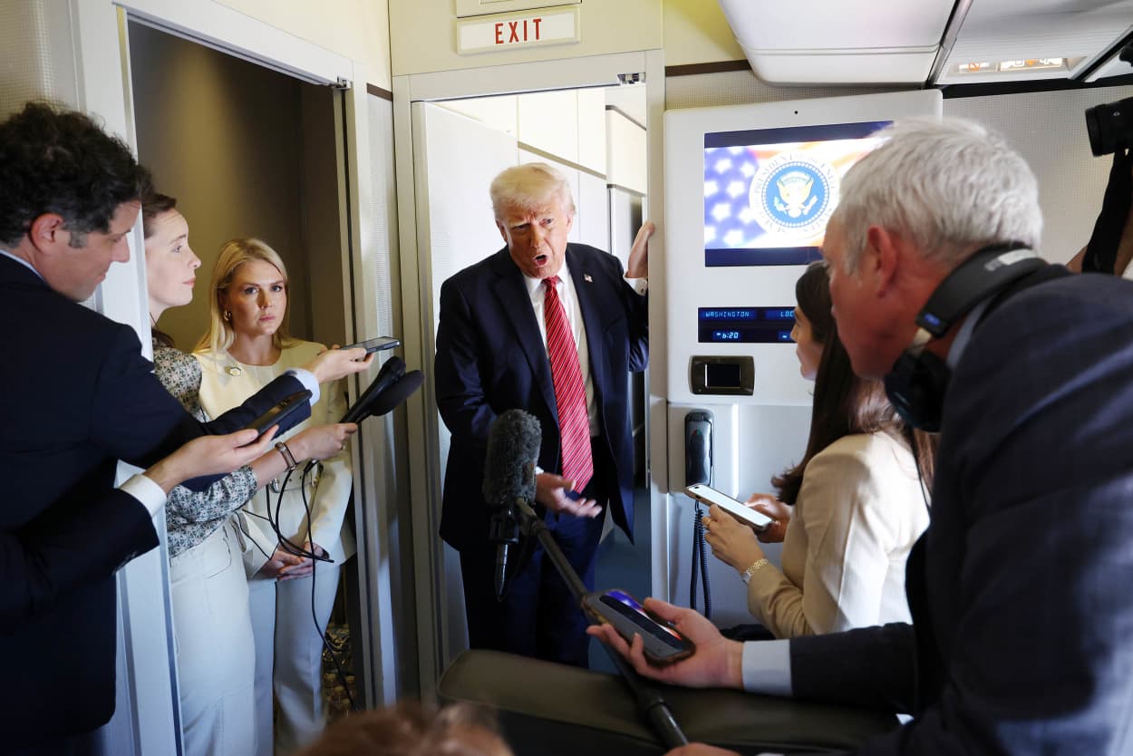 President Donald J. Trump speaks to travelling media aboard Air Force One