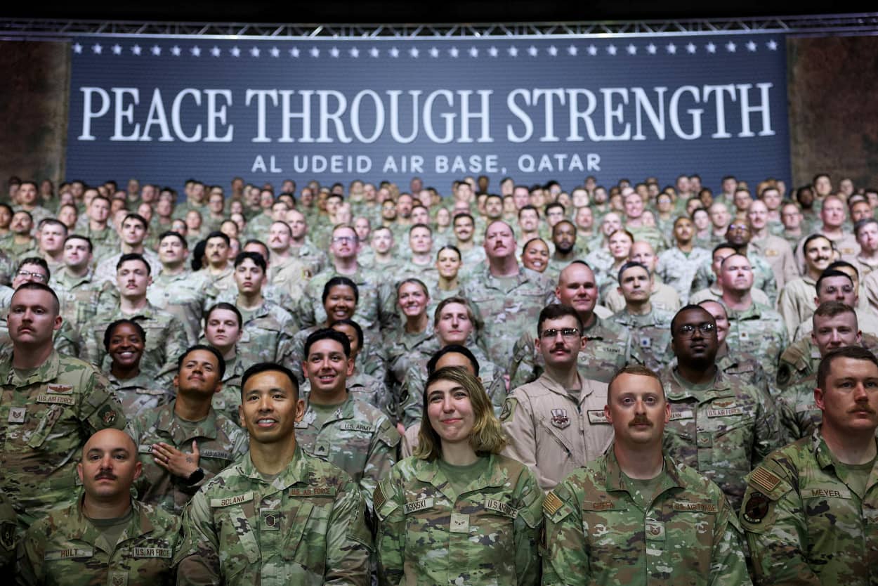 Military personnel wait for Trump's address