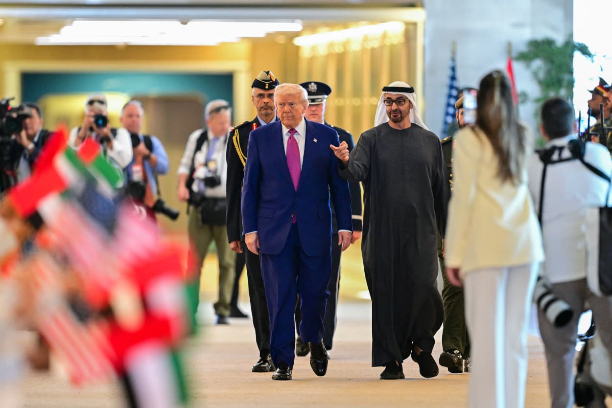 UAE President Sheikh Mohamed bin Zayed Al Nahyan welcomes President Donald Trump upon arrival at the presidential terminal in Abu Dhabi on May 15, 2025. 