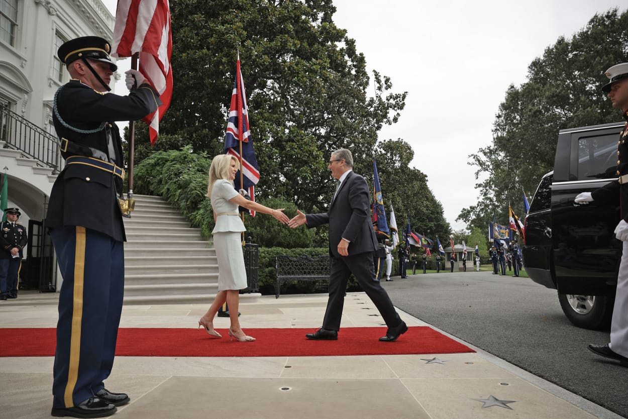 British Prime Minister Keir Starmer is greeted by Chief of Protocol Monica Crowley as he arrives at the White House