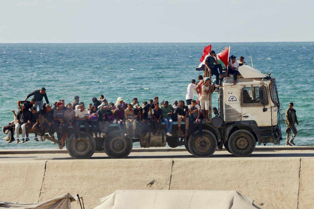 Palestinians return.