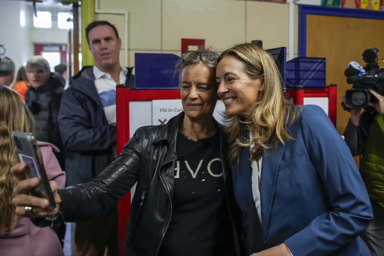 Rep. Mikie Sherrill, New Jersey Democratic gubernatorial candidate, poses with a supporter after casting her vote on Nov. 4, 2025 in Montclair, N.J. 