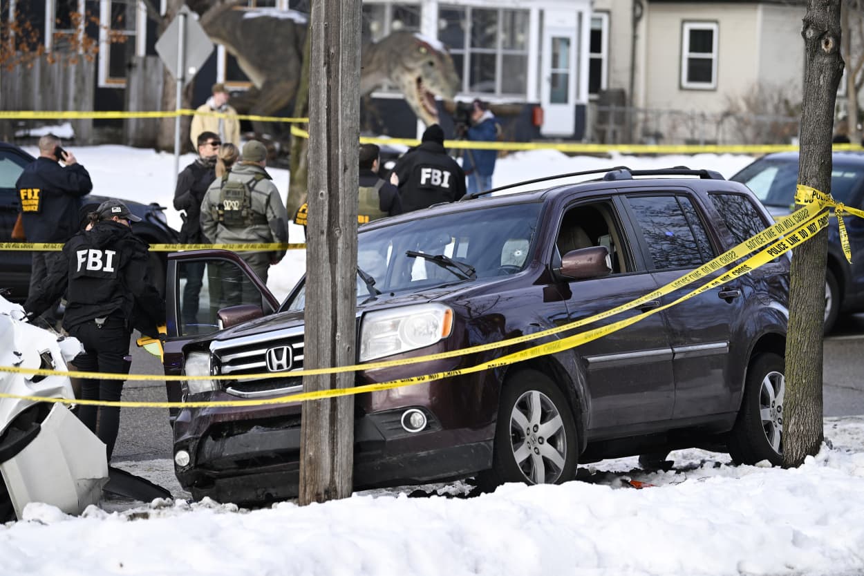 Members of law enforcement work the scene following a suspected shooting by an ICE agent during federal law enforcement operations on Jan. 7, 2026 in Minneapolis, Minnesota.