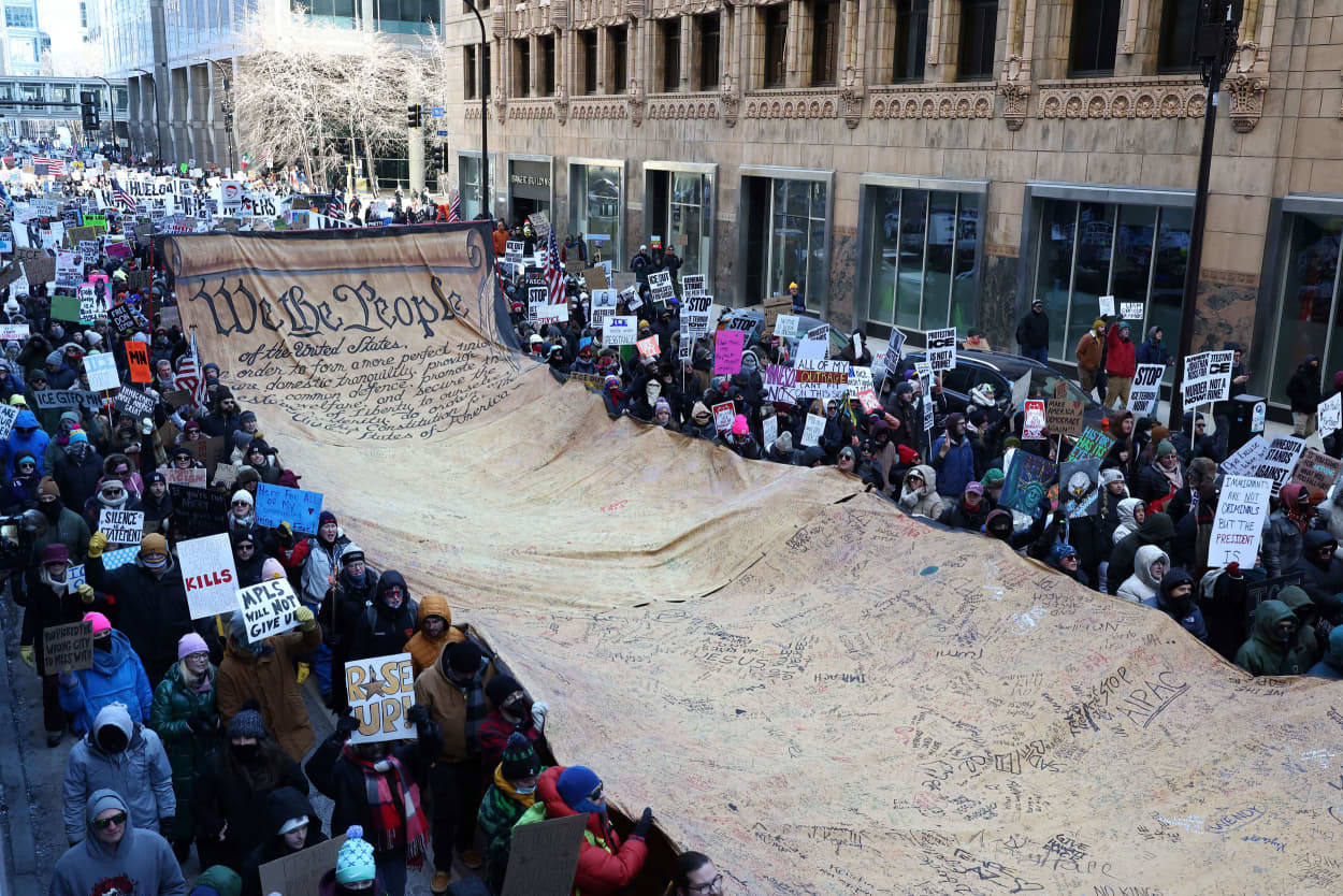 People partake in a "National Shutdown" protest against US Immigration and Customs Enforcement (ICE) in Minneapolis on January 30, 2026. 