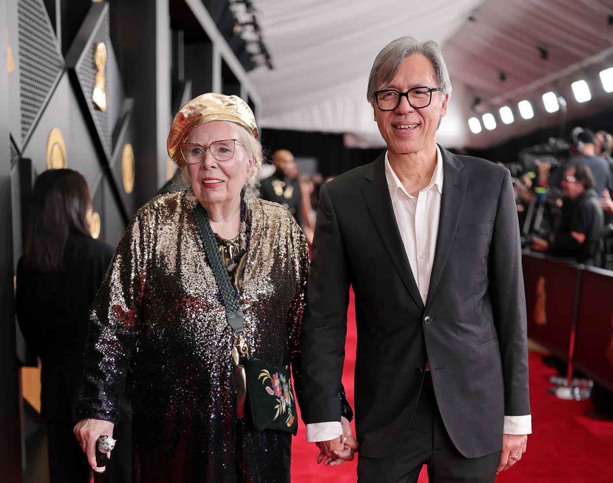 Joni Mitchell arrives on a red carpet to the 68th GRAMMY Awards.