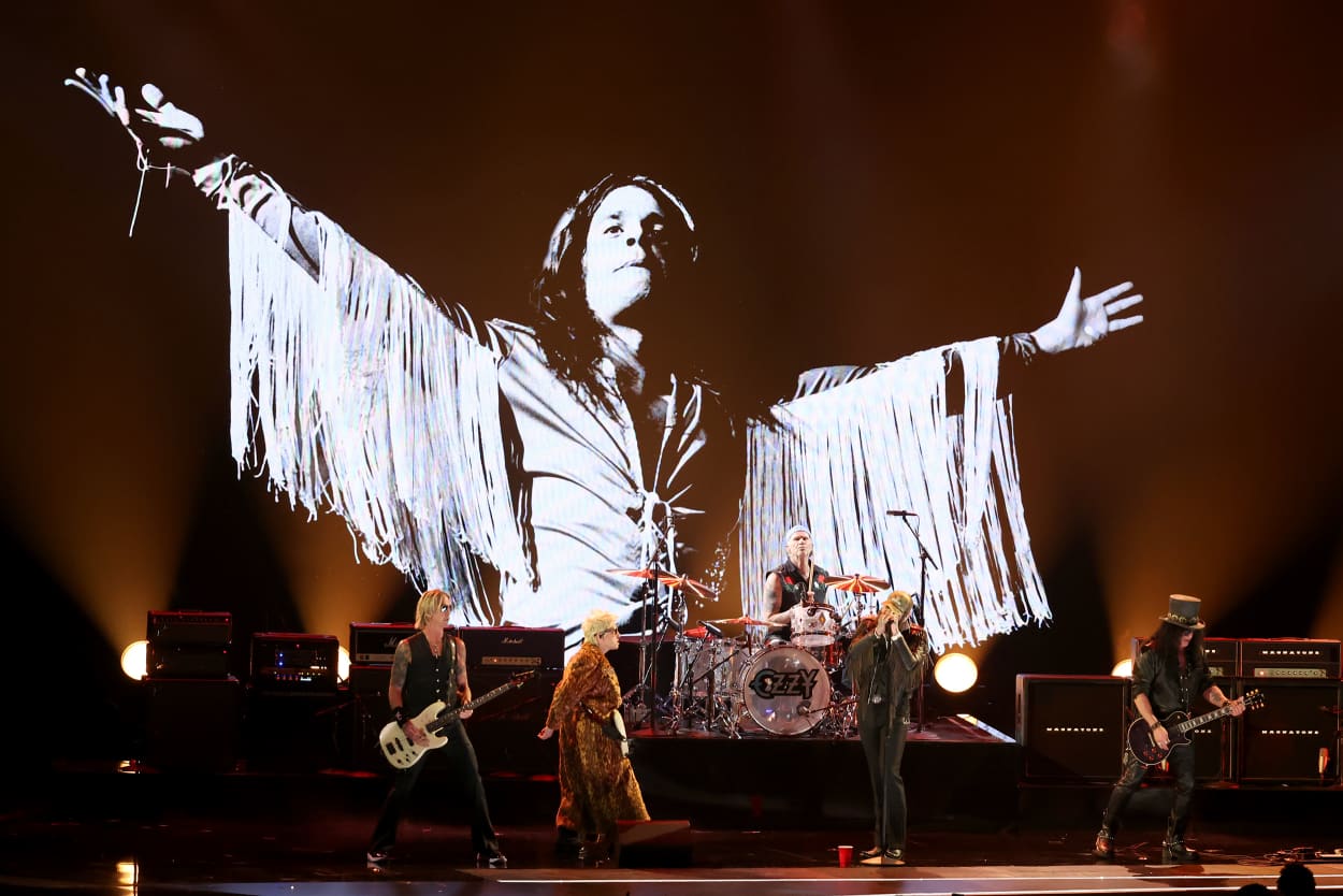 An image of Ozzy Osbourne is projected against a stage backdrop during a performance at the Grammy awards. 