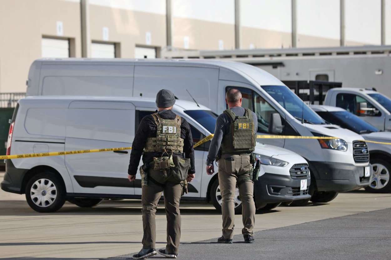 Members of the FBI Evidence Response Team outside the Fulton County Election Hub and Operation Center after the FBI executed a search warrant there in relation to the 2020 election, in Union City, Georgia on Jan. 28, 2026. 