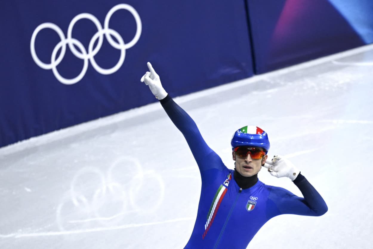 Italy's Pietro Sighel celebrates after winning gold in the short track speed skating mixed team relay final in Milan on Feb. 10, 2026.