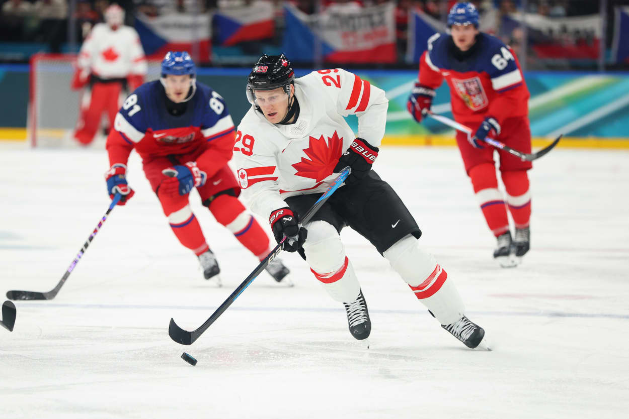 Nathan MacKinnon of Team Canada skates with the puck