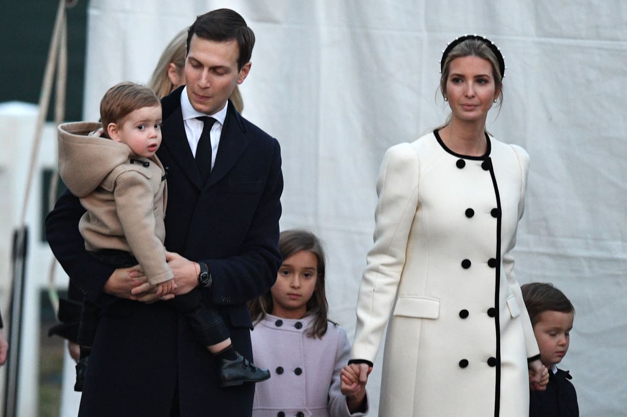 Image: Senior Advisor to the President, Jared Kushner, and Ivanka Trump, walk with their children at the Ellipse in President's Park near the White House