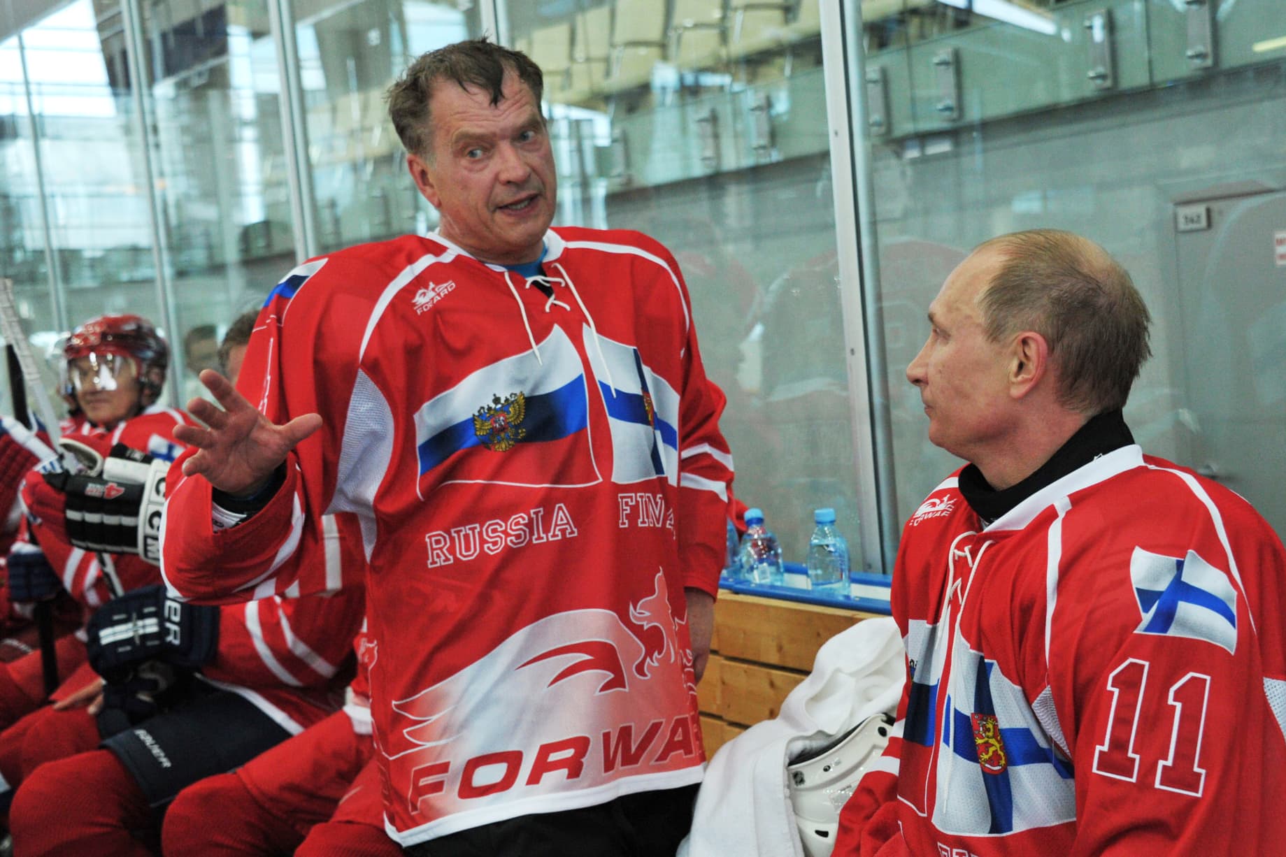 Russia's President Vladimir Putin (R) an