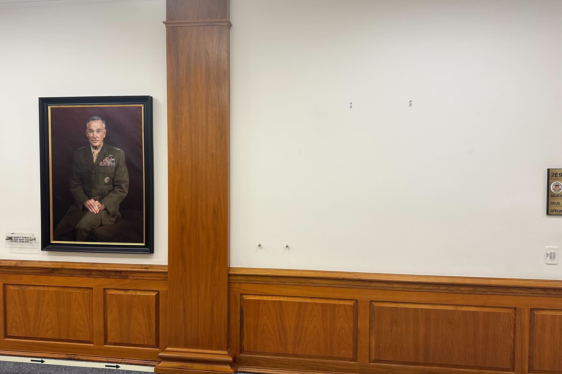 Blank space where portrait of Gen. Mark Milley used to hang.