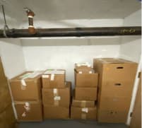 This image, contained in the indictment against former President Donald Trump, shows boxes of records that had been stored in the Lake Room at Trump's Mar-a-Lago estate in Palm Beach, Fla., after they were moved to a storage room on June 24, 2021. Trump is facing 37 felony charges related to the mishandling of classified documents according to an indictment unsealed Friday, June 9, 2023.
