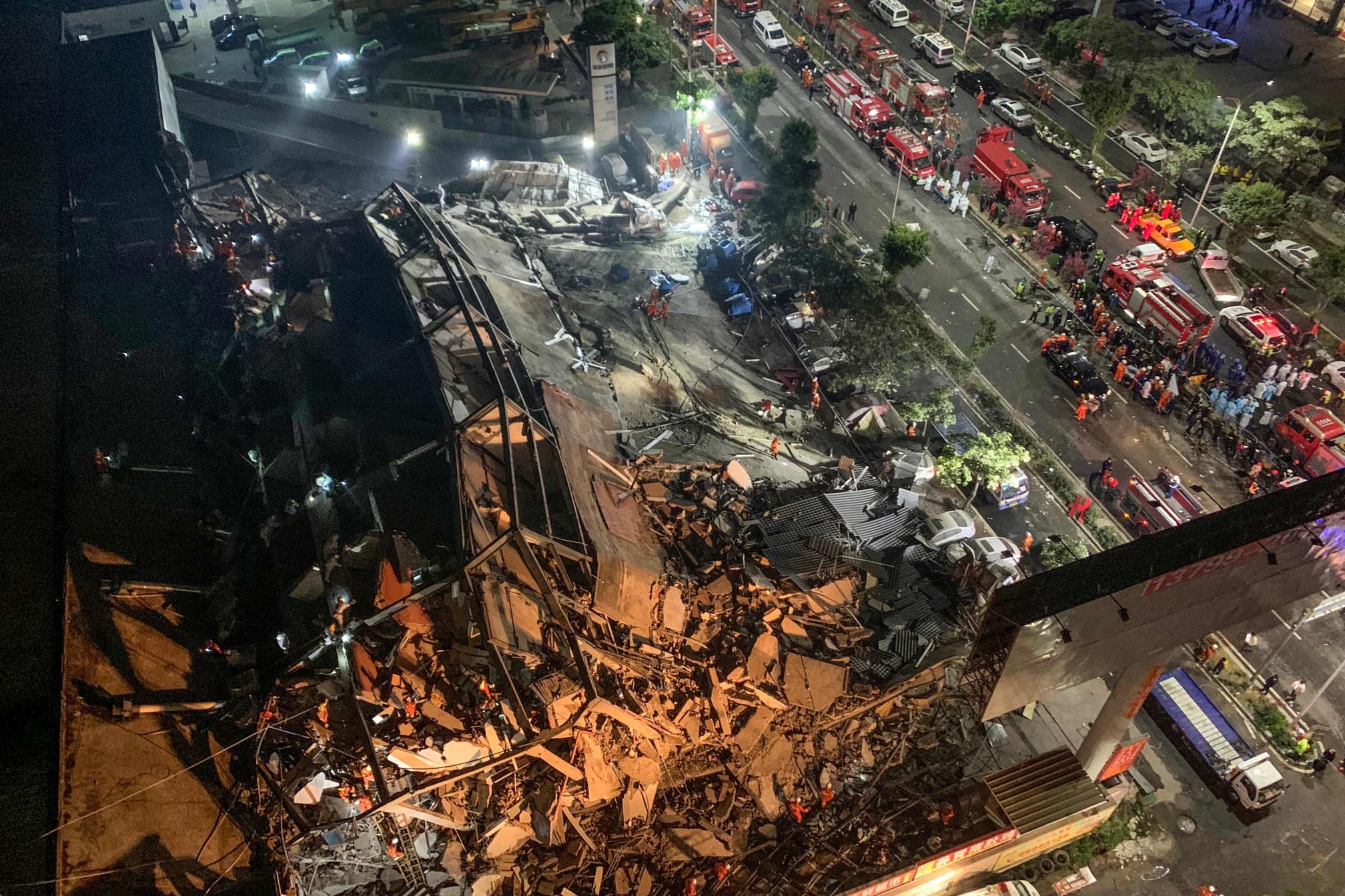 Image: TOPSHOT-CHINA-ACCIDENT-HOTEL
