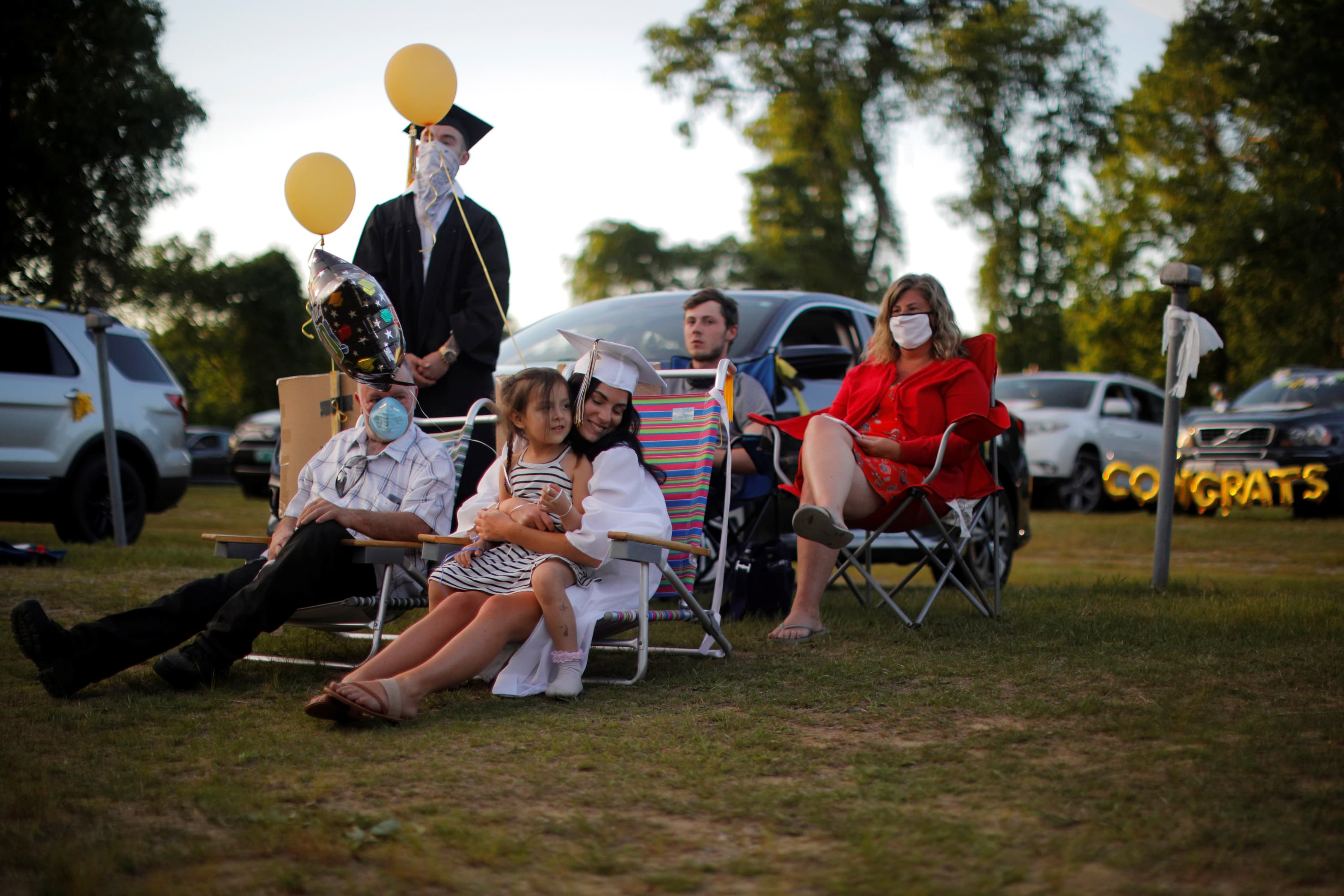 Image: High school graduation is held at a drive-in theater due to the outbreak of the coronavirus disease (COVID-19) in Hinsdale
