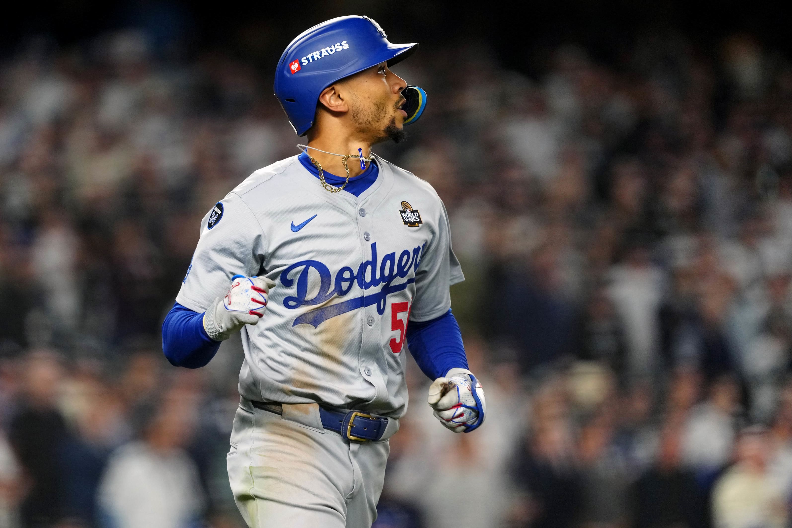 Mookie Betts watches his sacrifice fly 