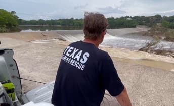 As a volunteer for TEXSAR, Jonathan McComb has spent the last four days alongside thousands of others working from dawn until dusk to clear mountains of debris that stretch for miles across Kerr County.