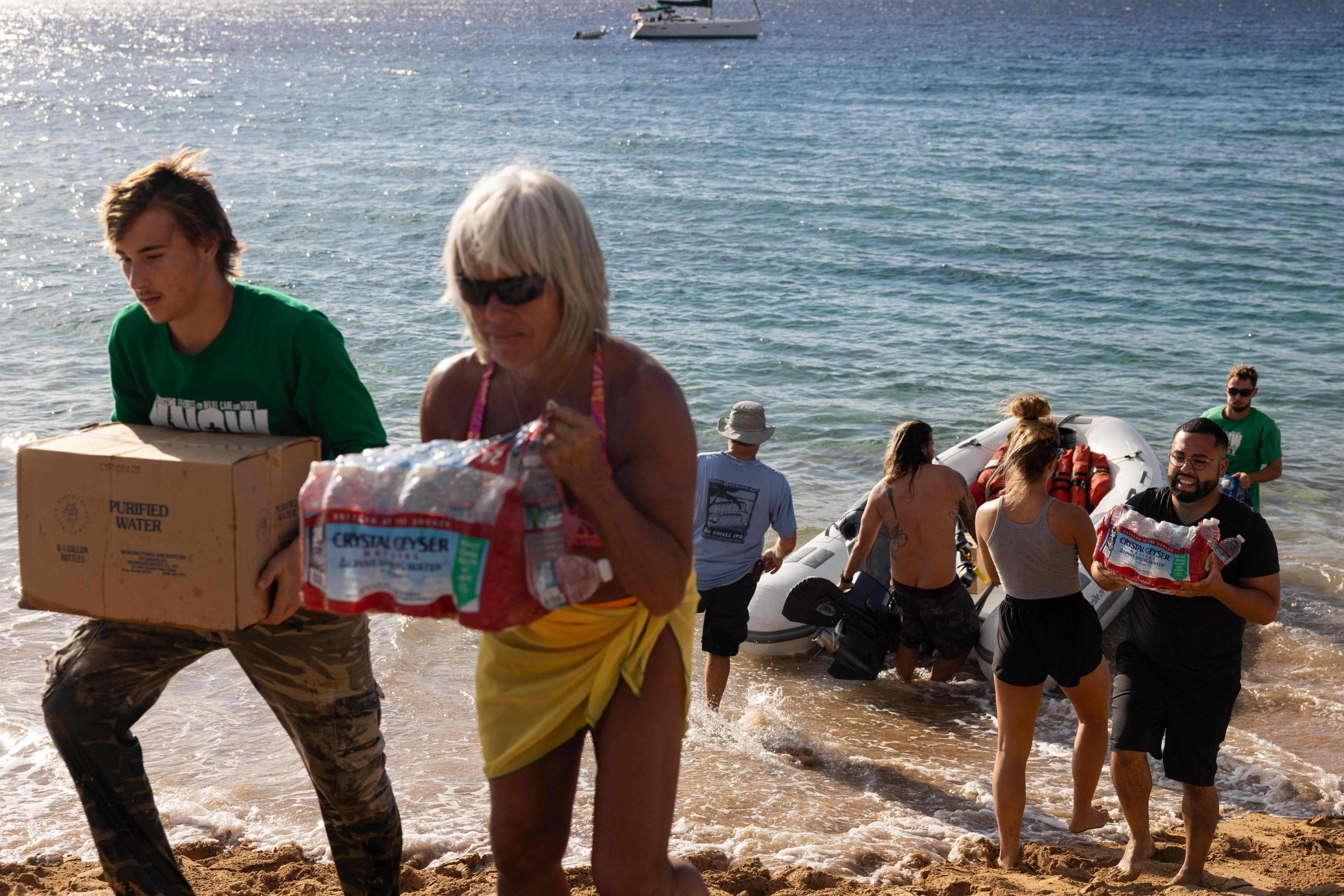 Mercy Worldwide volunteers unload supplies in Lahaina, Hawaii, on Aug. 12, 2023.