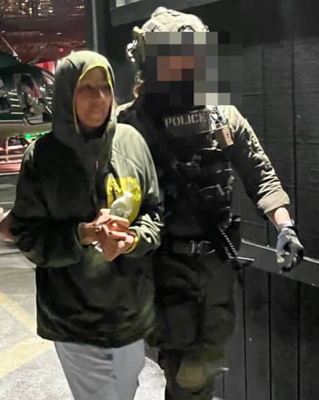 Cilia Flores is escorted by DEA agents outside