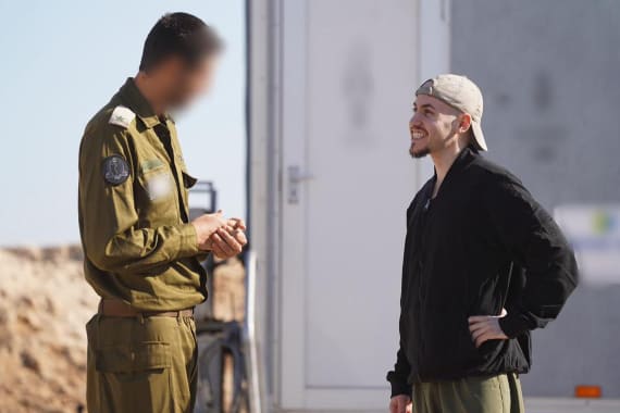 Israeli hostages cross back from Gaza into Israel on Oct. 13, 2025.
