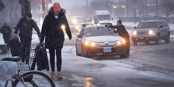 Snow and frigid temperatures in Chicago, St. Louis, Minneapolis Iowa and Kentucky.