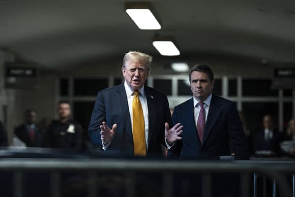 Donald Trump speaks to reporters